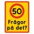 Hastighetsskylt med texten, frågor på det?